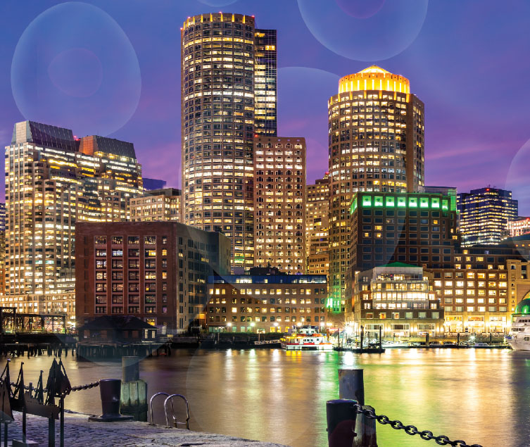 Image of downtown Boston at night.
